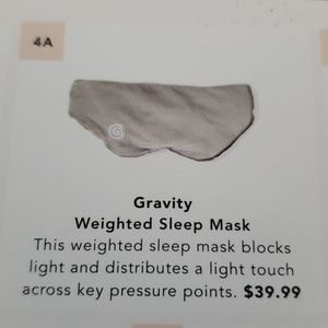Gravity weighted sleep mask